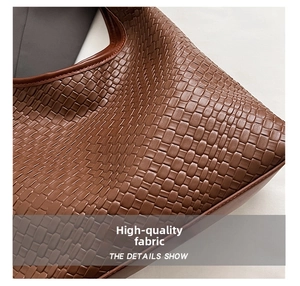 Close-up of premium brown leather woven pattern with intricate texture and smooth edges