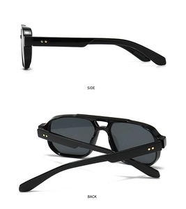 Side and back view of black retro sunglasses with gold rivet details on the frame