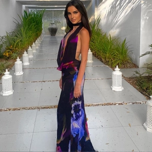 Floral halter backless maxi dress with abstract print and deep V-neck for resort wear