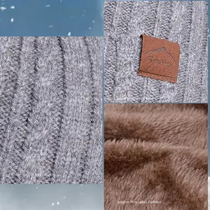 Three-piece winter knit hat set with thick fleece lining and grey cable-knit texture