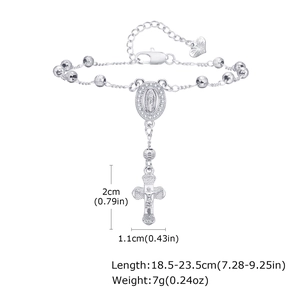 Détail du bracelet avec médaille Marie et crucifix montrant les mesures de 18,5 à 23,5 cm