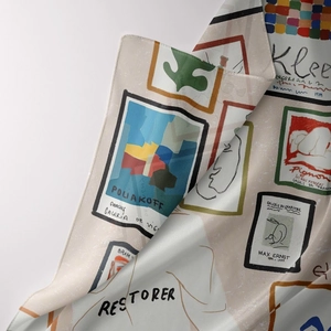 Macro detail of Bohemian tapestry showing modern art collage with silk-like fabric texture