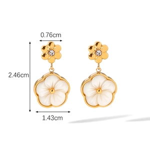 Detail of flower earrings with white shell petals and zircon centers showing dimensions