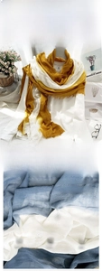 Detailed close-up of soft cotton linen scarf with ombre dip-dye finish and fringe edges