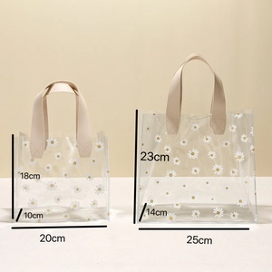 Transparent daisy PVC gift bags in two sizes with stylish cream leather handles