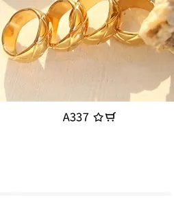 Detail showing gold quilted pattern engraving and mirror metal finish on jewelry rings