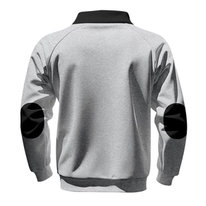 Detail view of mens grey sweatshirt featuring black stand collar and circular elbow patches