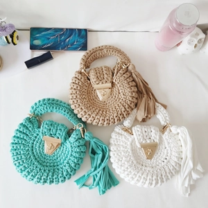 Bohemian round crochet shoulder bags in khaki, teal, and white with fringe and gold metal locks