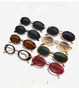 Collection of retro oval sunglasses in various colors with metallic temples