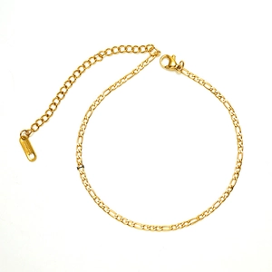 Elegant gold titanium stainless steel Figaro chain anklet with lobster clasp on white background
