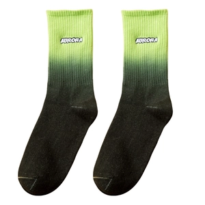 Gradient green and black crew socks with Aurora embroidery and ribbed cuffs