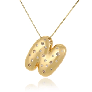 Detail of 18k gold heart pendant featuring sparkling zircon stones and a glossy finish