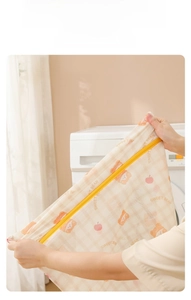Detailed view of durable fine mesh laundry bag showing its strong stretch resistance