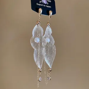 Elegant gold drop earrings with mesh fabric leaves, pearls, and long chain tassels