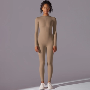 Close-up of the front zipper and stand collar on this khaki high-stretch sports jumpsuit