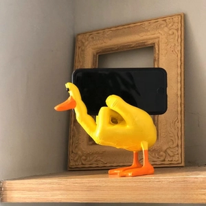Creative yellow duck phone holder made of resin for desk support and decoration