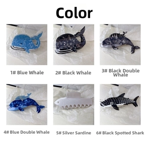 Selection of acetate ocean-themed hair claws featuring whale, sardine, and shark designs