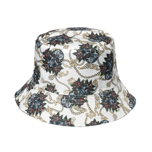 Punk style bucket hat with skull, chain and rose print on white twill fabric