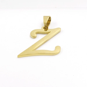 Macro shot of 18k gold plated stainless steel letter Z pendant with bail attachment