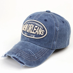 Vintage blue washed denim baseball cap with distressed details and Good Times embroidery