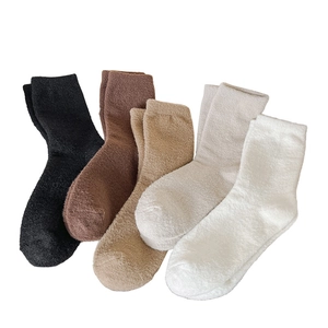 Five pairs of thick winter thermal socks for women in brown beige and neutral colors