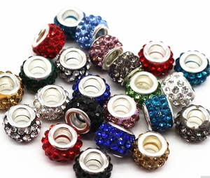 Macro shot of 7x12mm multi-color rhinestone clay beads for DIY jewelry making and bracelets