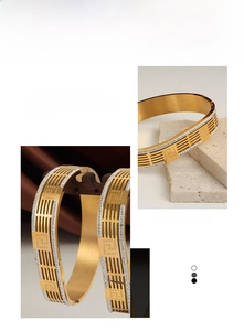 Detail view of gold hollow chain bracelet featuring micro-pave crystals and brushed finish