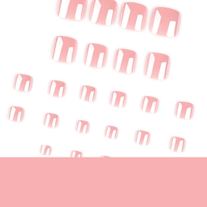 Glossy nude pink press-on toenails in a full 24-piece set layout for a sleek salon look
