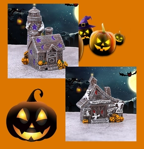 Miniature Halloween resin houses with pumpkins and ghosts on vibrant orange background