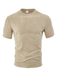Detail of khaki men's jacquard polo shirt showing size M label and 100% polyester fabric