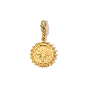 Macro shot of gold stainless steel sunburst charm pendant with lobster clasp attachment