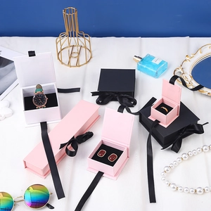 Elegant ribbon jewelry gift boxes in pink black and white for rings and watches