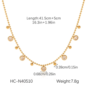 Detailed view of gold ball chain necklace with zircon pendants and size specifications