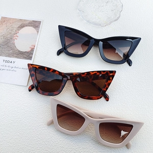 Three pairs of trendy cat eye blue light blocking glasses in black, leopard, and beige
