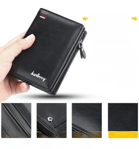 Detail of high-quality black PU leather men's wallet with multiple card slots and zipper pocket