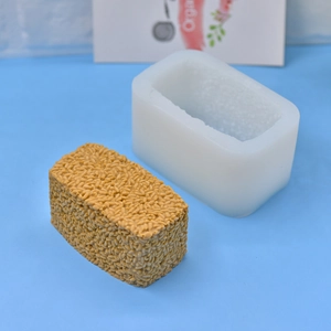 Rectangular rice ball shape silicone mold with textured handmade soap finished product