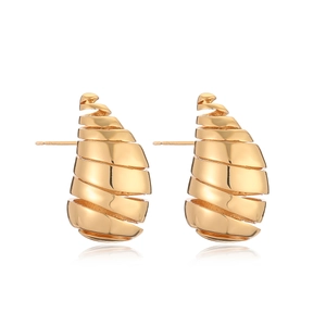 Elegant gold plated spiral teardrop stud earrings with a polished metallic finish on white back