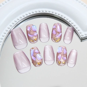Lilac cat-eye press-on nails set with glitter rhinestones and gold leaf in square-oval shape