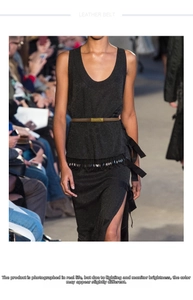 Close-up of a slim brown leather belt with a rectangular matte metal buckle on a black dress