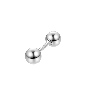 Macro shot of silver stainless steel barbell tongue ring with threaded ball ends