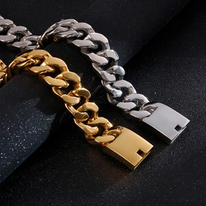 Macro shot of gold and silver cuban link necklaces featuring secure square clasps