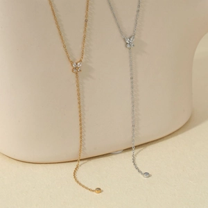 Elegant Y-shaped stainless steel necklace with butterfly pendants and white zircons