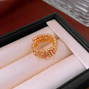 Vintage multi-layer gold beaded spiral adjustable ring for women with high metallic luster