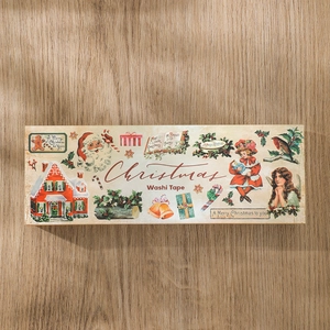 Close-up of vintage Christmas washi tape set with reindeer and Santa on wood background