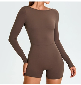 Brown long-sleeve athletic bodysuit with slim-fit design for yoga and fitness training