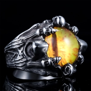 Gothic punk dragon claw ring with yellow evil eye in vintage stainless steel finish