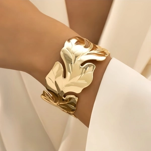 Chic gold-plated wide leaf cuff bracelet featuring intricate vein details for women