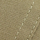 Macro detail of military green bomber jacket fabric with white reinforced stitching