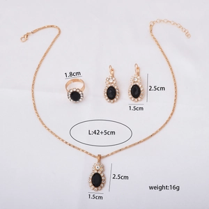 Detailed size view of gold necklace set with black oval stones and diamond accents