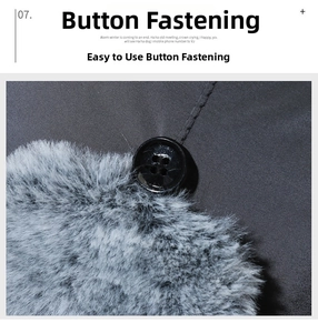 Close-up of black button closure and thick grey faux fur lining on winter earflap hat